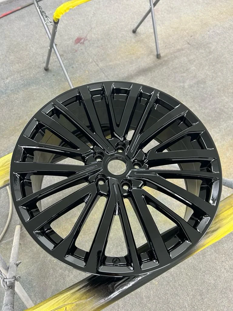Freshly refurbished gloss black alloy wheel — alloy wheel refurbishment service at Ant Fabrications, Banbury, Oxfordshire